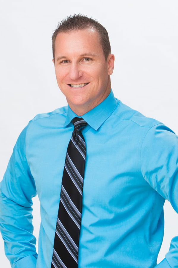 Portrait of Dr. John R. Jerome, D.D.S., M.S. — orthodontist and Invisalign Blue Diamond Provider in San Diego
