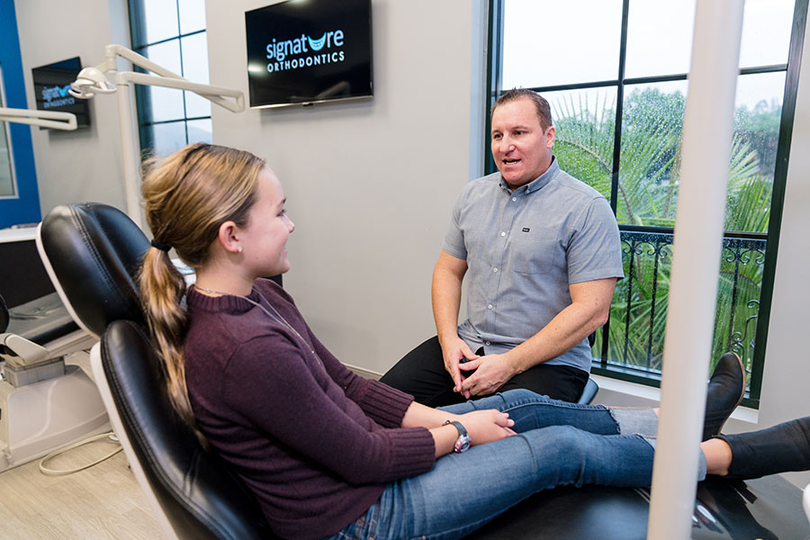 Damon Braces patient consultation with Dr. Jerome at Signature Orthodontics in San Diego